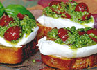 Pesto Cheese Crostini with Sun Dried Tomatoes